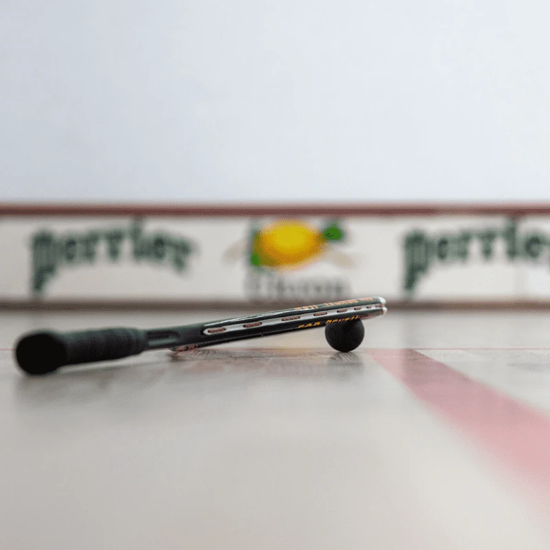 Raquette et balle de squash